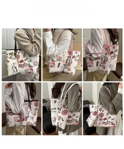 Detailed views of the printed tote bag set with colorful city landmarks and matching pouch