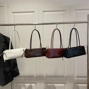 Retro aesthetic baguette shoulder bag with side bow detail in white, brown, red and black