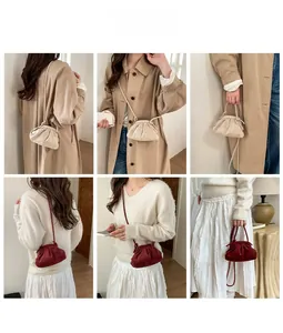 Styling showcase of pleated corduroy dumpling bags in off-white and burgundy colors