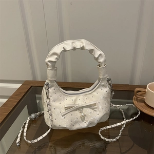 Chic beige ruched cloud bag with floral embroidery, pearl charm, and chain strap