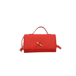 Red woven leather baguette handbag with golden knot clasp and detachable shoulder strap