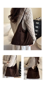 Detail view of large brown suede tote bag showing its spacious capacity and soft texture