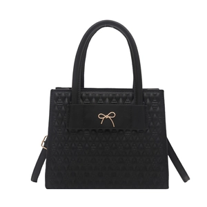 Chic black quilted tote bag with golden bow hardware and dual handles for women