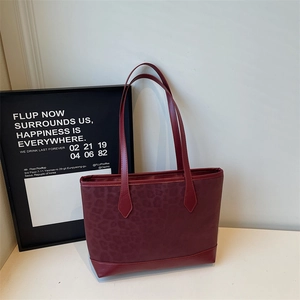Elegant wine red leopard embossed tote bag with large capacity and long shoulder handles
