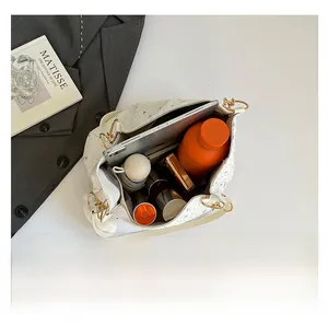 Interior view showing large capacity of the star pattern tote bag for tablets and daily items