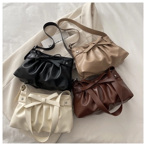 Detailed comparison of pleated tote bags in black, khaki, dark red, and cream colors