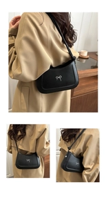 Detail showing the black crescent bag with a silver metal bow buckle from multiple perspectives