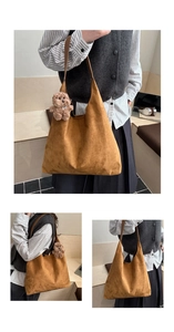 Detail view of large brown suede hobo bag with a cute plush bear charm accessory