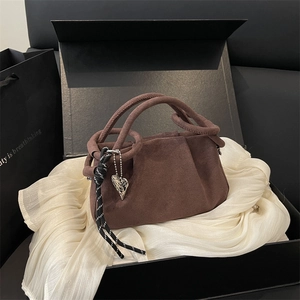 Retro dark brown pleated handbag with a round handle and heart pendant in a gift box