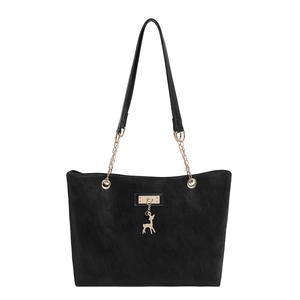 Minimalist black matte faux suede tote bag with golden deer charm and chain strap