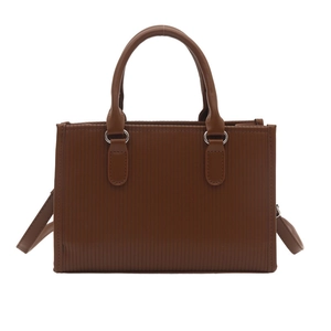 Chic caramel brown square shoulder bag with vertical embossed texture and silver hardware