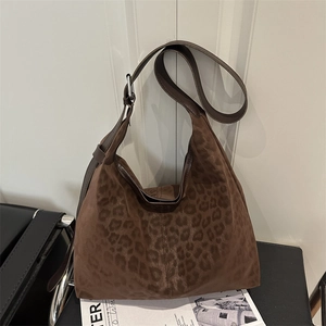 Brown leopard print hobo shoulder bag in faux suede with adjustable leather strap