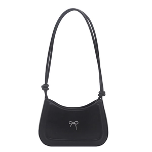 Minimalist black leather hobo bag for women with elegant silver bow decoration