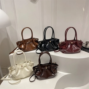 Pleated PU leather bucket bags in five colors with gold magnetic closures and straps
