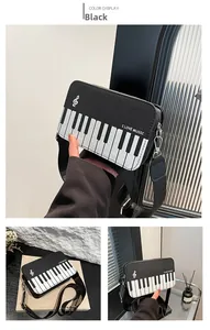 Macro detail of piano key pattern and I LOVE MUSIC slogan on black crossbody bag