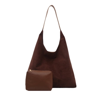 Large dark brown vintage tote bag with matching small zippered pouch and long shoulder strap
