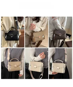 Detailed views of stylish lychee grain leather handbags with wide shoulder straps and zippers