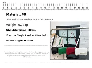 Detail view of crocodile pattern shoulder bag with size specs and material info