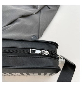 Detail of creative piano bag showing the I LOVE MUSIC print and durable black zipper