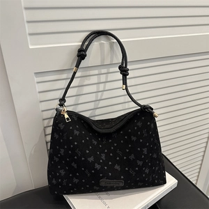 Retro black corduroy tote bag with butterfly heart patterns and golden ring hardware detail