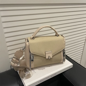 Chic beige canvas and PU leather handbag with wide strap and square metal buckle