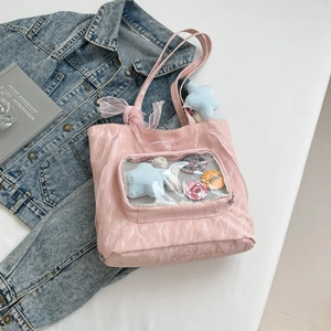 Sac Ita rose transparent avec froufrous, badge ours fraise et nœud en organza