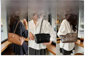 Detailed comparison of brown and black retro tote bags shown in a shoulder carry style