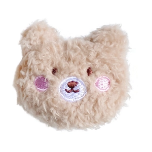 Simpatico supporto per cellulare a forma di orsetto di peluche con sorriso ricamato