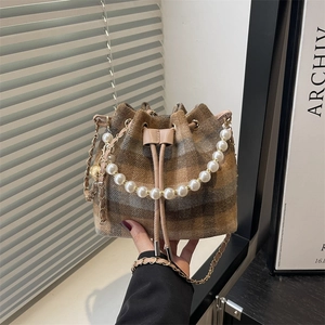 Fashionable plaid bucket bag with pearl handle and chain strap for spring 2026 fashion