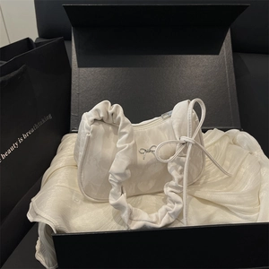 White ruched underarm bag with silver bow accent in elegant gift box set