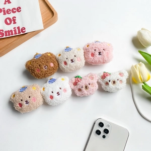 Detailed view of assorted plush bear charms featuring embroidery for phone grip DIY