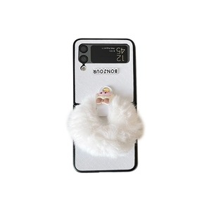 White Samsung Z Flip case with leather texture, plush ring, and Bonjour lettering