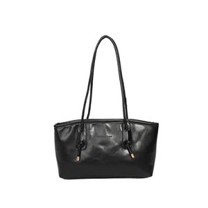 Grand sac cabas noir en cuir synthétique avec détails dorés et fines lanières