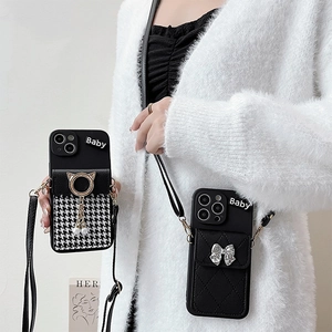 Crossbody iPhone case with houndstooth pattern pearl charms and adjustable strap