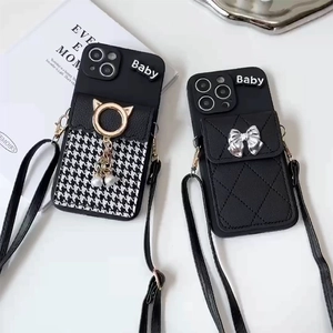 Crossbody iPhone cases featuring houndstooth pattern and quilted leather with straps