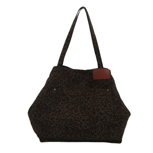 Minimalist leopard print tote bag with red leather accent for daily commuting use