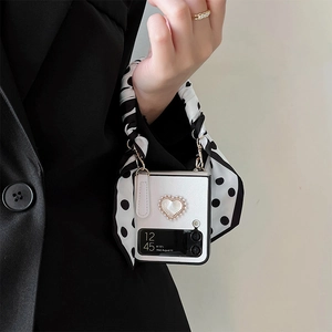 Litchi pattern Samsung Z Flip case with pearl heart and polka dot ribbon handle