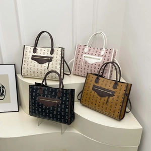 Four versatile tote bags with cartoon bear prints and leather pockets in multiple colors
