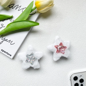 Detail of plush star phone sockets with sparkling pink and silver sequin star accents