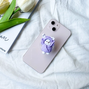 Cute purple bunny collapsible phone socket grip on smartphone with minimalist tulip background