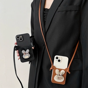 Crossbody leather phone case with cute bunny bow in black and brown options