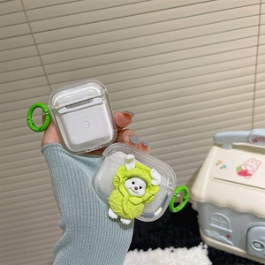 Detailed view of clear AirPods case with cute 3D cartoon bunny cabbage and green carabiner