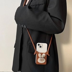 Brown leather iPhone case with cute rabbit embroidery and crossbody shoulder strap detail