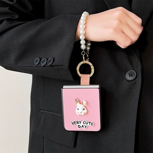 Pink leather Galaxy Z Flip 6 case with pearl chain and cute 3D bunny accessory