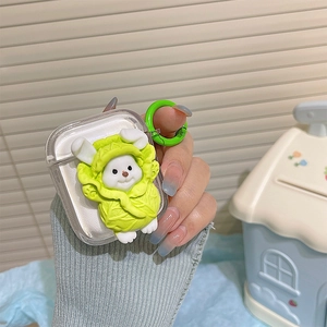 Detail of clear TPU AirPods case with a 3D cartoon rabbit in cabbage outfit and green ring