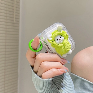 Close-up of clear silicone AirPods case featuring a 3D cabbage rabbit and green hook