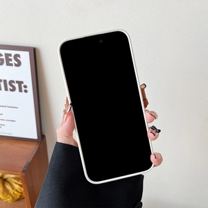 White silicone iPhone case with brown leather strap detail, stylish hand-held view