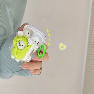 Macro detail of transparent AirPods case with 3D cartoon vegetable bear character