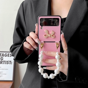 Pink leather phone case with pearl bow and handle for Galaxy Z Flip series
