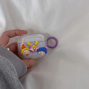 Detail of clear AirPods case with cute 3D cartoon characters and purple ring clip